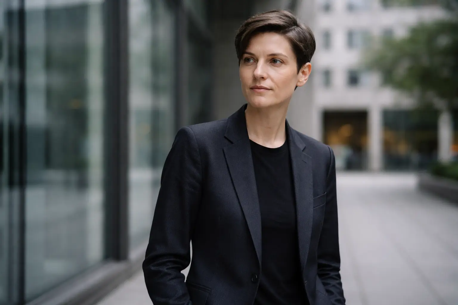 Professional woman reflecting on the confidence gap in financial stability amid economic uncertainty