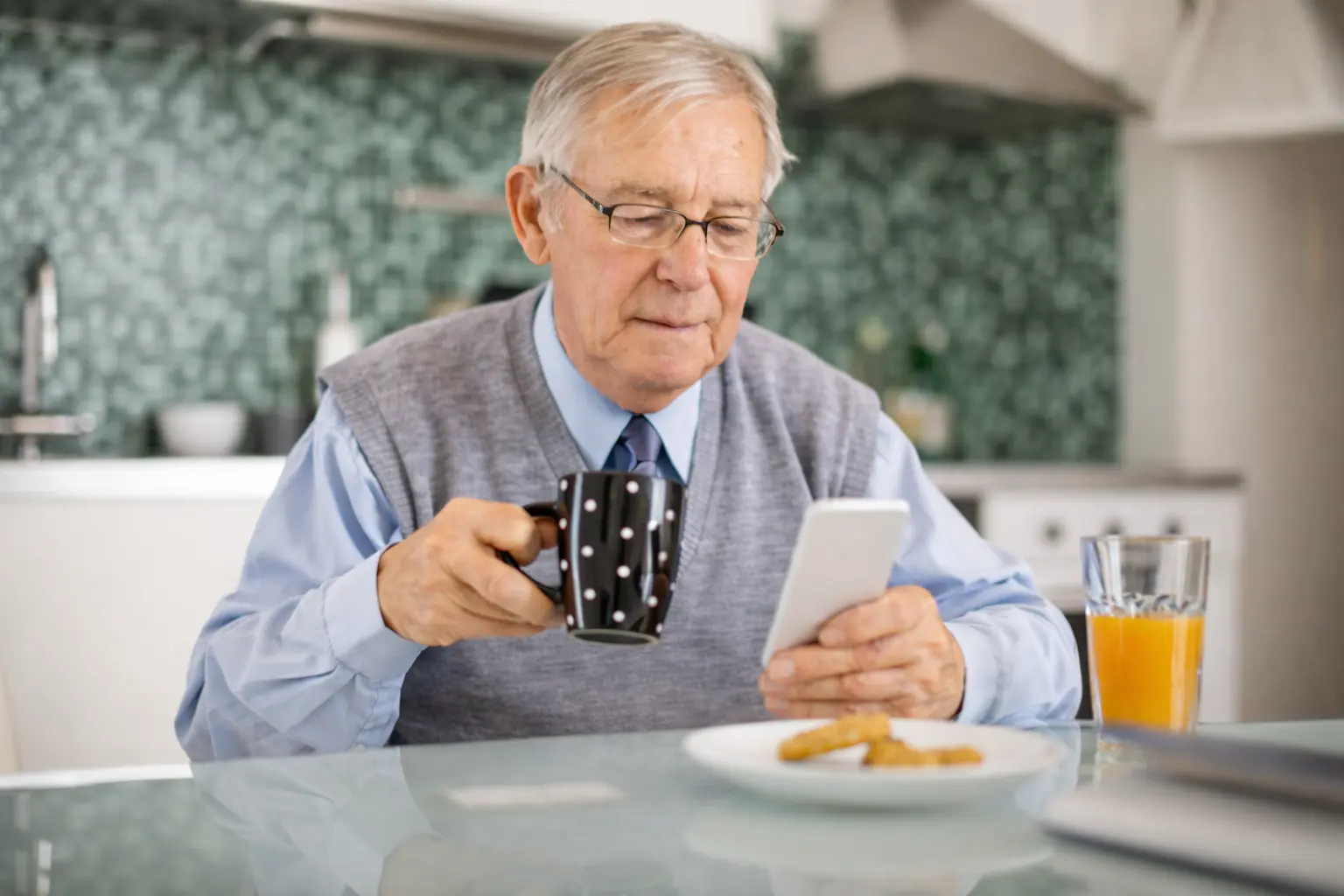 Senior checking bank balance on smartphone during Social Security payment day morning