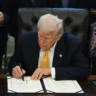 U.S. president signing an official order confirming a federal deposit program