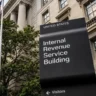 IRS Midnight Batch delay showing Internal Revenue Service building as March 19 refunds remain pending due to Treasury 310 processing