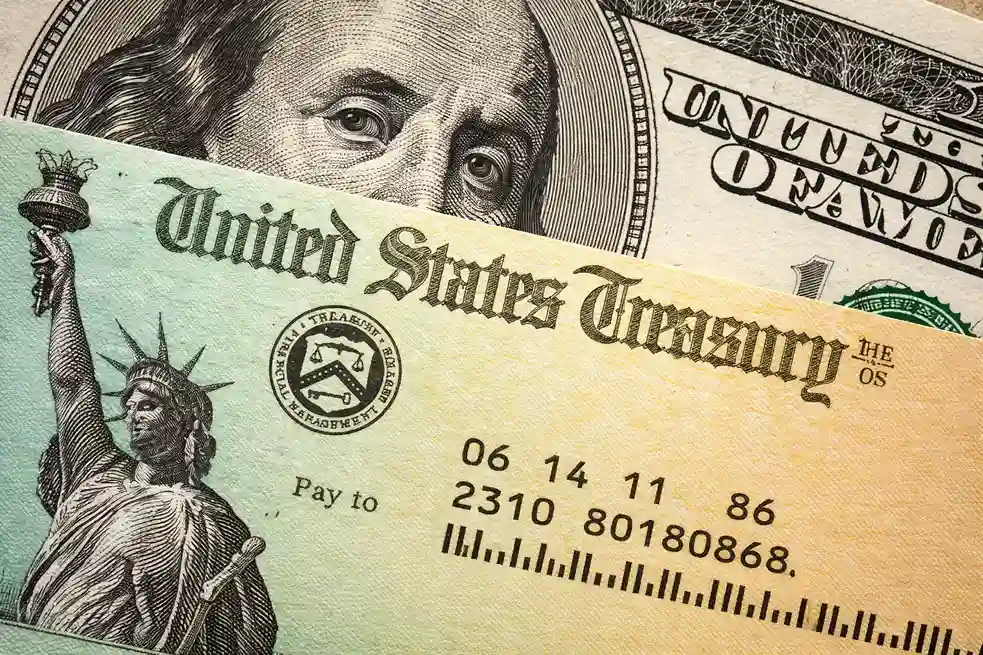 U.S. Treasury check with dollar bill representing treasury deposits moving through banks during morning clearing