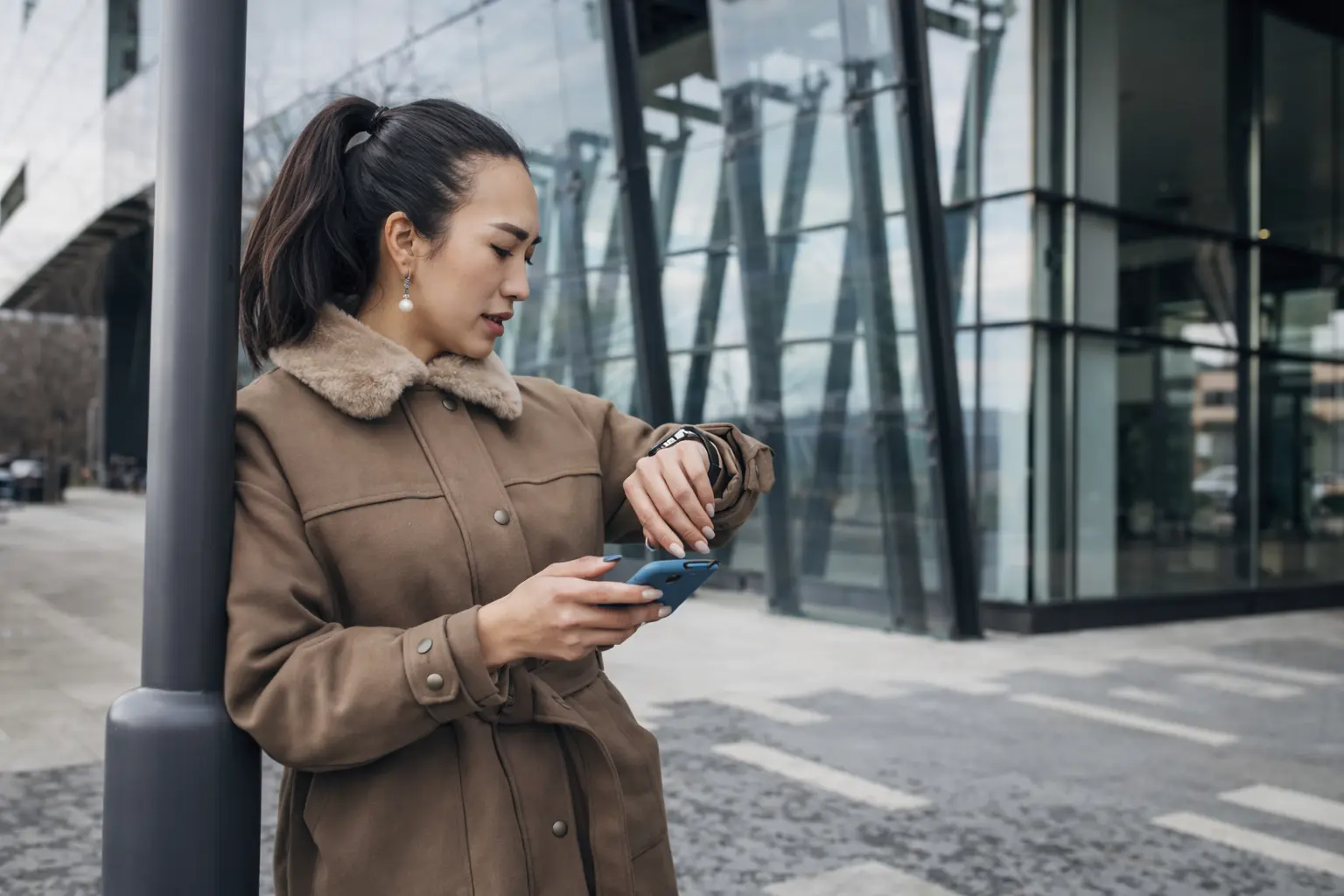 Customer checking mobile banking app while treasury payments entering banks and balances updating
