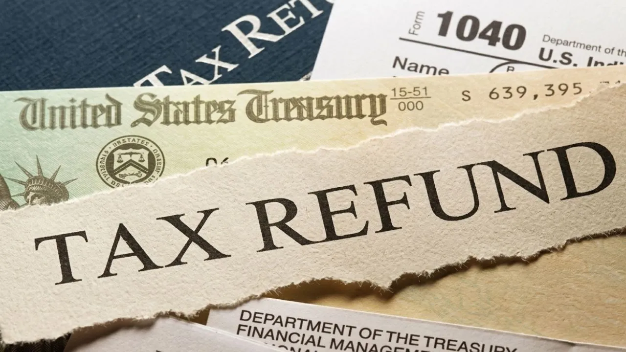 IRS refund processing in May 2026 showing delayed tax refunds after April 15 deadline with taxpayers checking refund status online