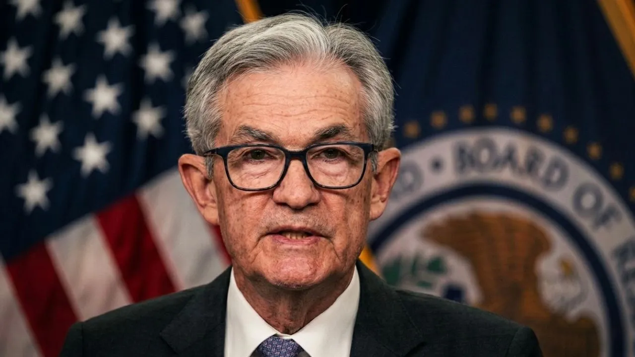 Jerome Powell seated at Federal Reserve board table as governor after chair term ends May 2026, with implications for social security payments and interest rates