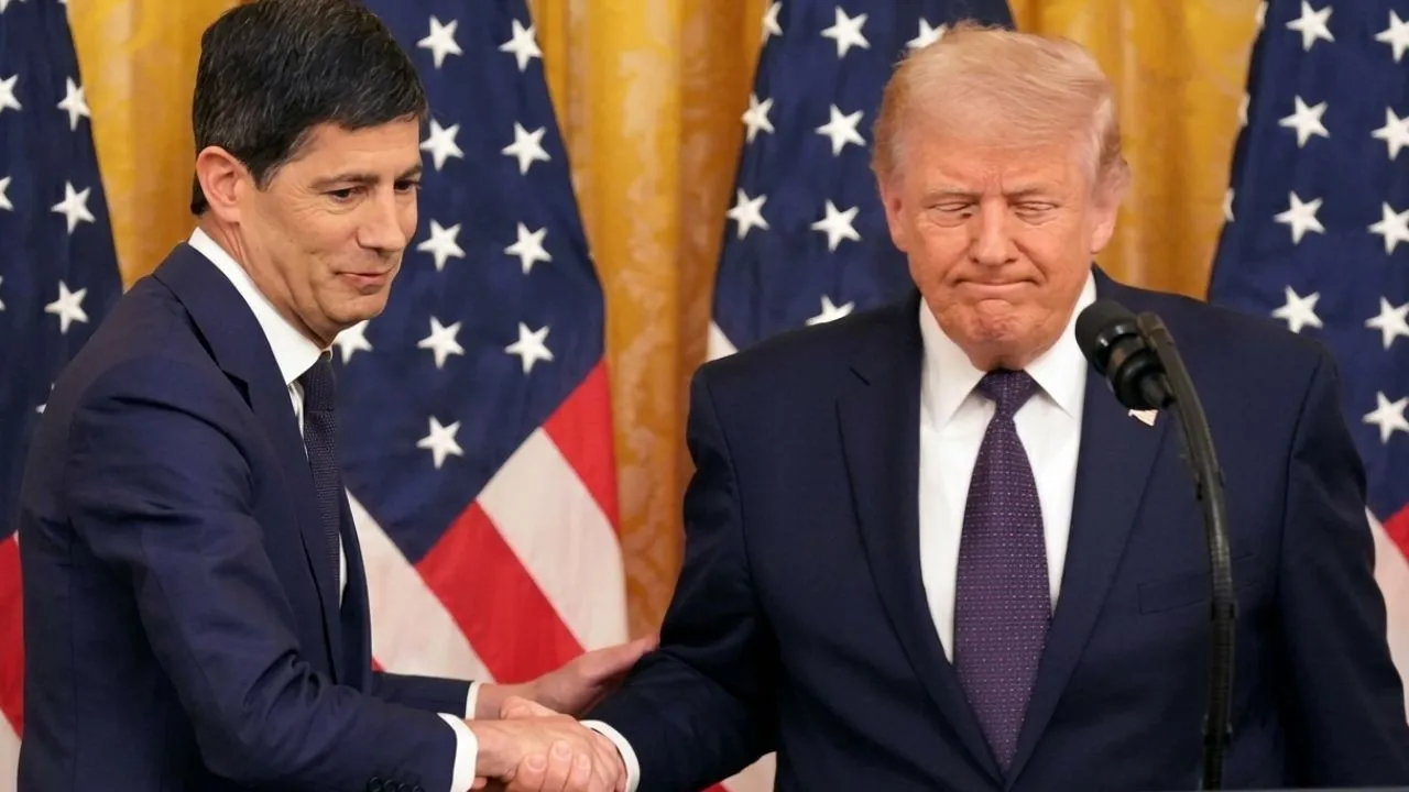 Federal Reserve Chair Kevin Warsh presenting at his inaugural monetary policy press conference during the June 2026 FOMC session in Washington, addressing sticky inflation and the federal funds interest rate right now.