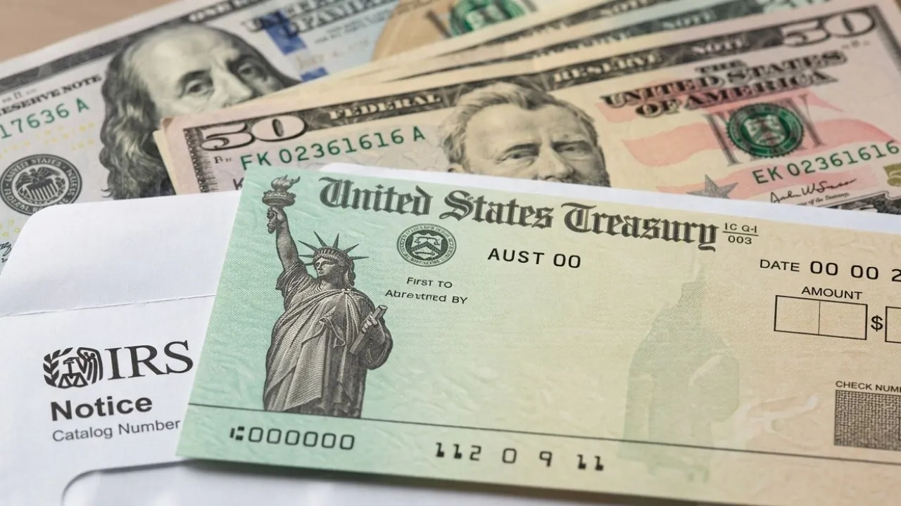 Smartphone showing IRS refund direct deposit notification in June 2026