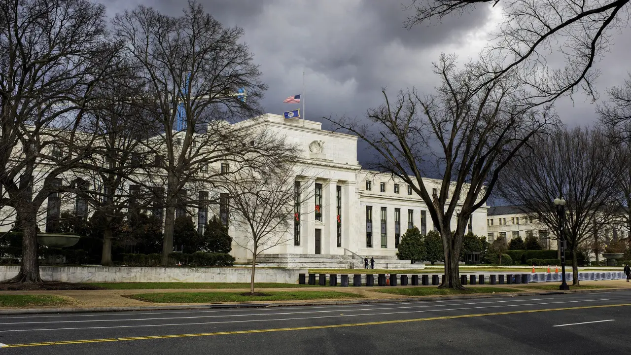 Federal Reserve headquarters in Washington, D.C., where policymakers announce U.S. interest rate decisions affecting inflation, borrowing costs, savings, and the economy.