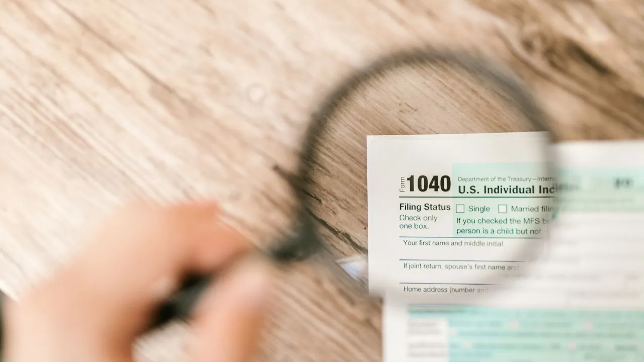 Taxpayer entering a six digit IRS Identity Protection PIN while filing taxes securely on a laptop