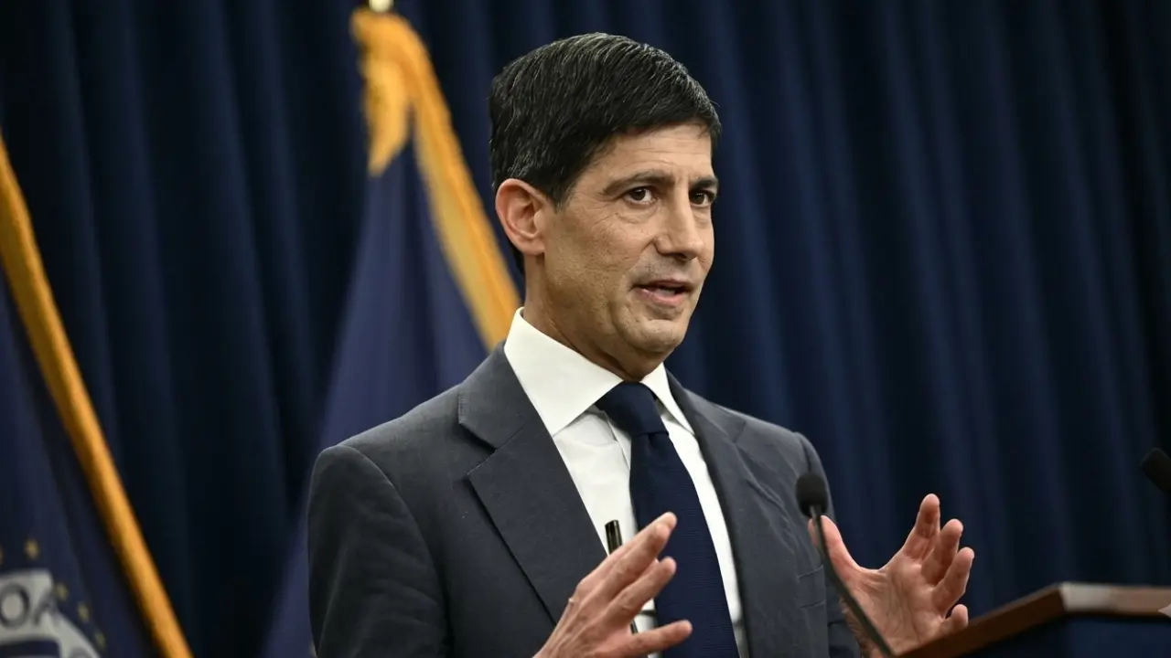 Federal Reserve Chair Kevin Warsh speaking at a podium during a policy announcement