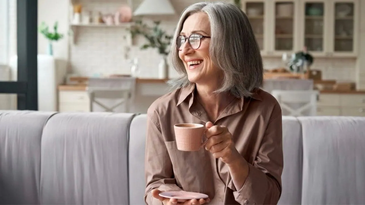 A retiree reviews RMD rules and required minimum distribution paperwork at home
