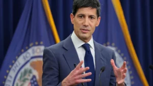 Latest U.S. Financial News and Analysis 15 Federal Reserve Chair Kevin Warsh at a podium during an FOMC press conference in 2026