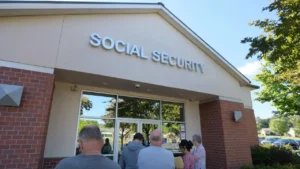Latest U.S. Financial News and Analysis 20 People entering a Social Security office as August 19, 2026 benefit payments are scheduled for eligible beneficiaries.