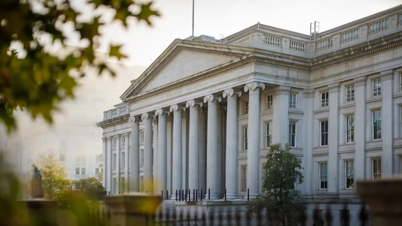 Federal Reserve style government building representing the U.S. Treasury processing a child support refund offset