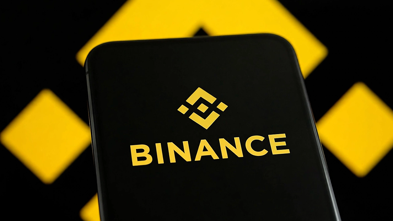 Binance logo displayed on a smartphone as Binance invests $100 million in Circle and expands its USDC partnership