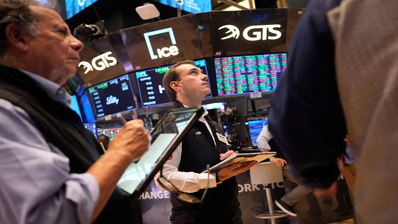 Traders work on the New York Stock Exchange floor as the Dow posts its worst week since March and Treasury yields rise.
