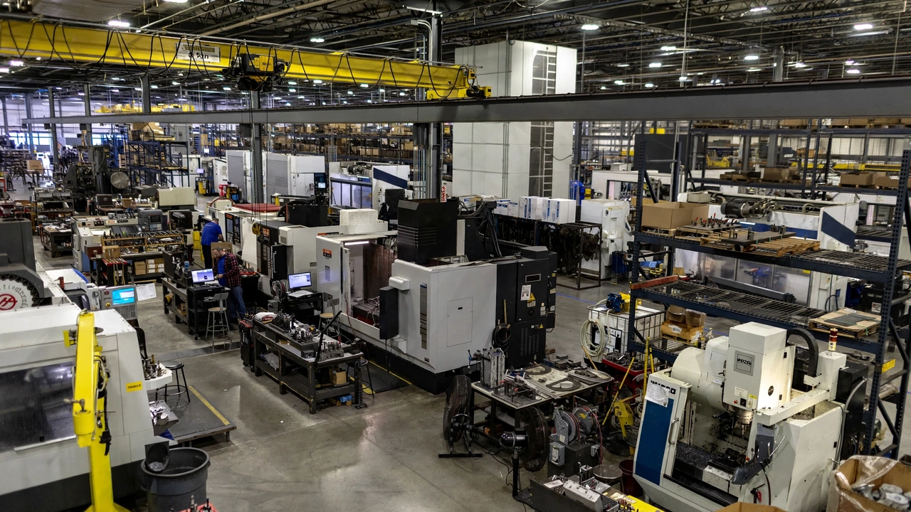 Wide view of a U.S. manufacturing facility with industrial machines and workers on the factory floor