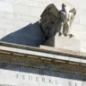 Stone eagle sculpture on the Federal Reserve building in Washington, D.C.