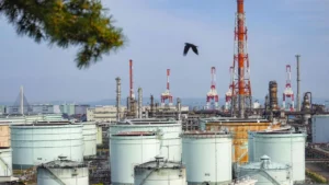 Latest U.S. Financial News and Analysis 29 Large oil storage tanks and refinery infrastructure at an industrial petroleum facility.