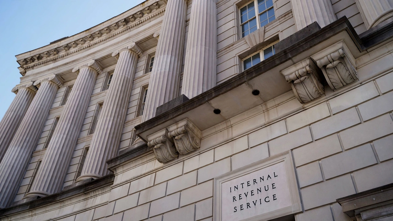 Low-angle view of the Internal Revenue Service building facade, showing stone columns and the Internal Revenue Service inscription.