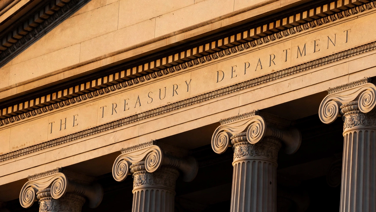 Exterior of the U.S. Treasury Department building in Washington, D.C., showing its engraved name and classical columns.